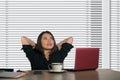 Successful Asian Chinese business woman working confident at modern office computer desk in female businesswoman job smiling chee Royalty Free Stock Photo