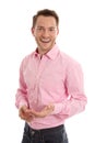 Successful attractive young man in pink with open hand gesture i