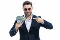 Successful business man counting money. Handsome middle age man holding bunch of 100 dollar banknotes. Guy holding money Royalty Free Stock Photo