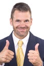 Successful business man gives thumbs up Royalty Free Stock Photo