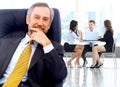 Successful business man standing with his staff Royalty Free Stock Photo