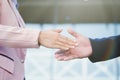 Successful business peolple handshaking after good deal.