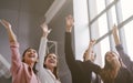 Successful of Business People Celebrating In office. Group of Happy business team hands raised for success and winning. Royalty Free Stock Photo