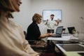 Successful business people collaborating and strategizing in a boardroom meeting. Royalty Free Stock Photo