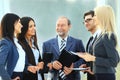 Successful business team with documents in office Royalty Free Stock Photo