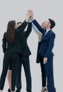 Successful business team giving a high fives gesture as they lau Royalty Free Stock Photo