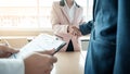 of successful business team shaking hands with eachother in the Royalty Free Stock Photo