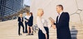 Successful business team walking on stairs in . Royalty Free Stock Photo