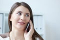 Successful business woman getting good news on mobile phone. Smiling woman talking on mobile phone. Business success Royalty Free Stock Photo