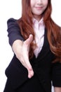 Successful business woman holds out her hand Royalty Free Stock Photo