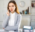 Successful business woman pointing her finger at you in office Royalty Free Stock Photo