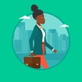 Successful business woman walking with briefcase. Royalty Free Stock Photo