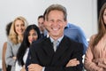 Successful Businessman Boss Over Businesspeople Group Background, Mature Leader With Business People Team Confident Hold