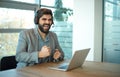 Successful businessman entrepreneur holding fists up celebrating important job agreement with customer deal done. Royalty Free Stock Photo