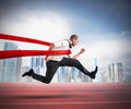 Successful businessman on the finishing line Royalty Free Stock Photo