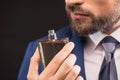 Successful businessman likes perfume scent Royalty Free Stock Photo