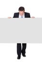 Successful businessman presenting empty banner Royalty Free Stock Photo