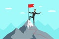 Successful businessman with red flag on mountain peak. Business man climbing up on top career ladder. Male goal Royalty Free Stock Photo