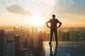 Successful Businessman on the top of skyscraper looking at the city skyline background