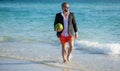 Successful businessman on vacation. Hot summer business. Summer vacations and travel concept. business man on the beach