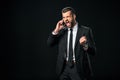 successful businessman yelling while talking on smartphone, Royalty Free Stock Photo