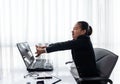 Successful businesswoman relaxing in her chair at the office Royalty Free Stock Photo