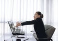 Successful businesswoman relaxing in her chair at the office Royalty Free Stock Photo