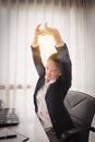 Successful businesswoman relaxing in her chair at the office Royalty Free Stock Photo