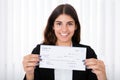 Successful Businesswoman Showing Cheque Royalty Free Stock Photo