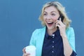 Successful businesswoman standing in front of her office, talking on phone hearing good news. She is very happy Royalty Free Stock Photo