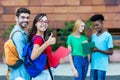 Successful caucasian male and nerdy female student