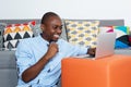 Successful cheering african american man with computer Royalty Free Stock Photo