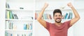 Successful cheering latin american man with beard and dark hair Royalty Free Stock Photo