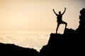 Successful climbing or hiking, inspiring silhouette in mountains