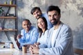 Successful company with happy workers in modern office. Royalty Free Stock Photo