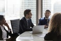 Successful company management staff participate in formal negotiations in boardroom Royalty Free Stock Photo