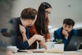 Successful Corporate Team Gathered at Table for Brainstorming and Discussing Business Strategies Royalty Free Stock Photo