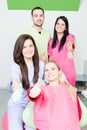 Successful dental team showing like gesture Royalty Free Stock Photo