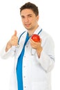 Successful doctor holding apple Royalty Free Stock Photo