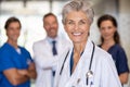 Successful doctor with medical team at hospital Royalty Free Stock Photo