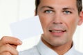 Successful entrepreneurs shows blank business card