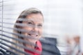 Successful Executive businesswoman standing near office window Royalty Free Stock Photo