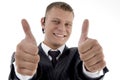 Successful executive with thumbs up hand gesture