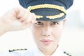 Successful female captain pilot at the airport, portrait. Commercial aviation Royalty Free Stock Photo