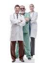 successful female doctor standing in front of her colleagues Royalty Free Stock Photo