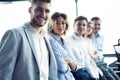 Successful friendly team with happy workers in office. Royalty Free Stock Photo