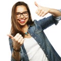 Successful girl gives thumb up with two hands Royalty Free Stock Photo