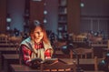 Successful Girl Studying Hard in Library Royalty Free Stock Photo