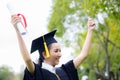 Successful graduating student with nature background, Happy graduated student girl.