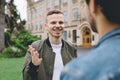 Successful happy students standing near campus or university outside Royalty Free Stock Photo